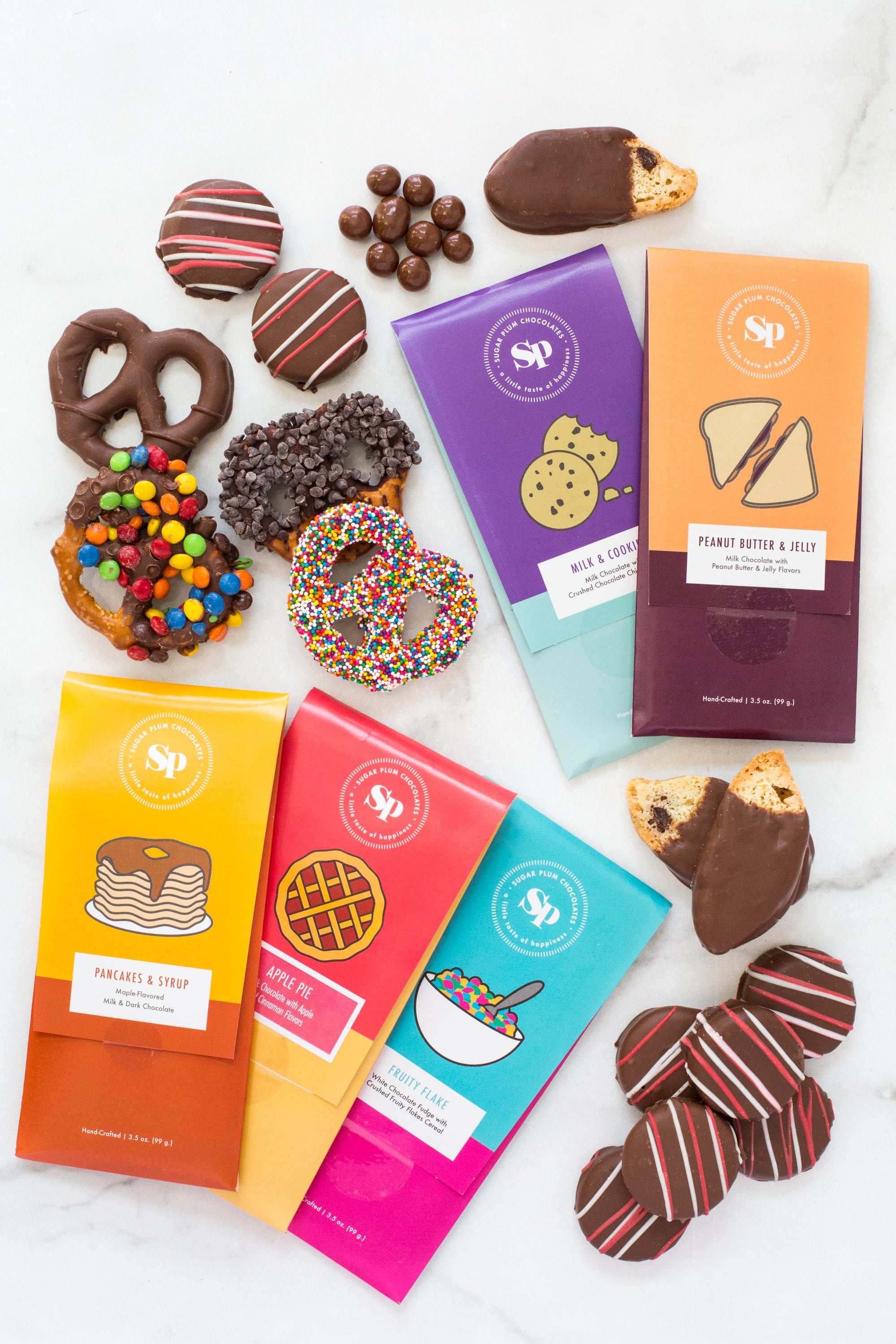 Nostalgic Chocolate Bar Gift Box with assorted handcrafted bars and treats, featuring flavors like Peanut Butter & Jelly and Pancake & Syrup.