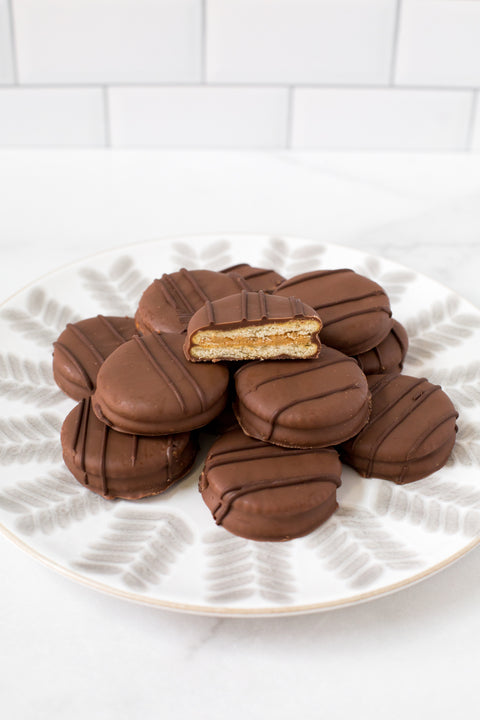 12 handcrafted chocolate-covered peanut butter cracker cookies for your snacking pleasure.