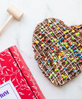 Chocolate Heart Pizza and Wooden Smash Mallet photo