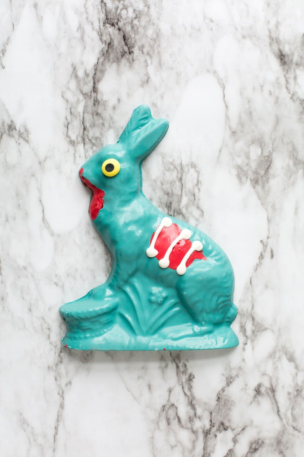 Handcrafted white chocolate zombie bunny with eerie details, perfect Halloween treat for spooky celebrations and parties.