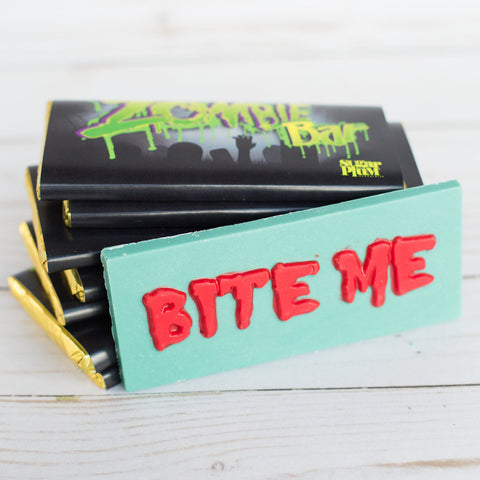 Handcrafted Chocolate Zombie Bar with "Bite Me" text, spooky green white chocolate with crispies, Halloween party candy.