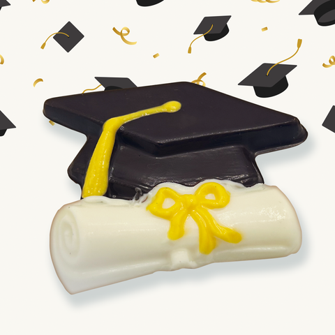 Graduation-themed chocolate cap and diploma in festive packaging with confetti.