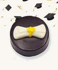 Up close view of one of the chocolates contained in the box, a graduation letter chocolate 