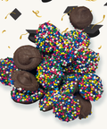 Up close view of one of the treats contained in the box, nonpareils