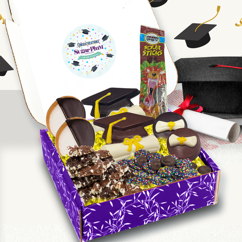 Happy Graduation Box with graduation-themed chocolates, cookies, and snacks, perfect for celebrating academic achievements.