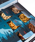 2024 Gourmet Advent Calendar with savory meat sticks, nut medley, and scenic winter design. Limited edition holiday gift box.