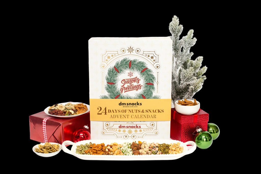 dm snacks Advent calendar with Christmas decorations and snacks on a white background