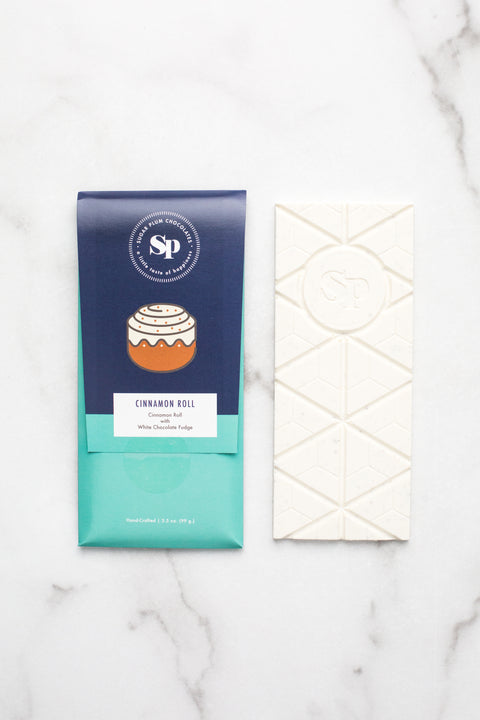 Cinnamon Roll White Chocolate Bar with packaging, featuring handcrafted design and nostalgic candy flavors.