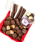 Gourmet chocolate gift box with chocolate-covered potato chips, cookies, pretzels, and hand-dipped treats in festive packaging.