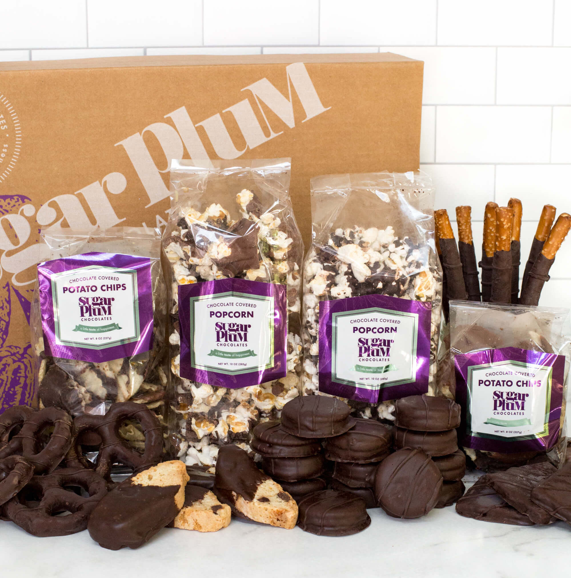 Sugar Plum Chocolates Gourmet Chocolates, Nuts, Gifts