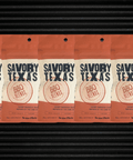 Five-pack of Savory Texas BBQ Seasoning featuring bold BBQ spice blend packaging on a textured background.