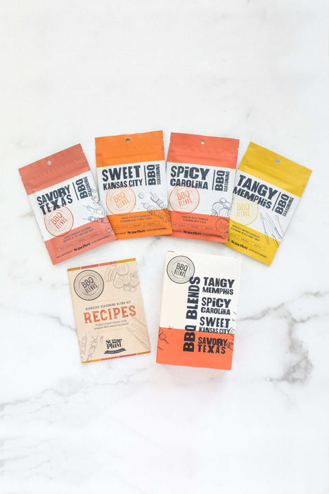 BBQ Blends 4 Flavor Spice Packets featuring savory, sweet, spicy, and tangy seasonings with recipe guide on marble surface.