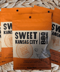 Sweet Kansas City BBQ Seasoning 5-pack showcasing orange packaging with smoky, sweet barbecue blend for ribs, chicken, and pork.