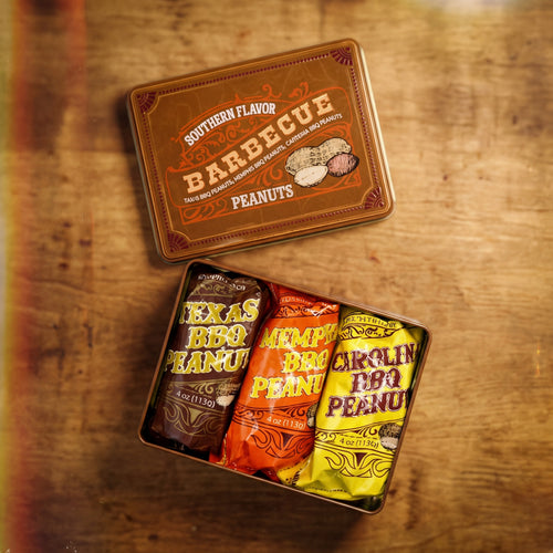 Tin of Southern Flavor Barbecue Peanuts with three varieties on a wooden surface