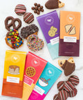 Nostalgic Chocolate Bar Gift Box with assorted handcrafted bars and treats, featuring flavors like Peanut Butter & Jelly and Pancake & Syrup.