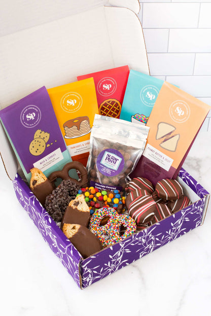 Nostalgic Chocolate Bar Gift Box with handcrafted bars in playful flavors like Peanut Butter & Jelly, perfect for any occasion.
