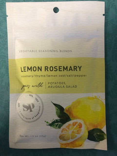 Lemon Rosemary Vegetable Seasoning Blend packet with lemon and rosemary illustrations on a green background.