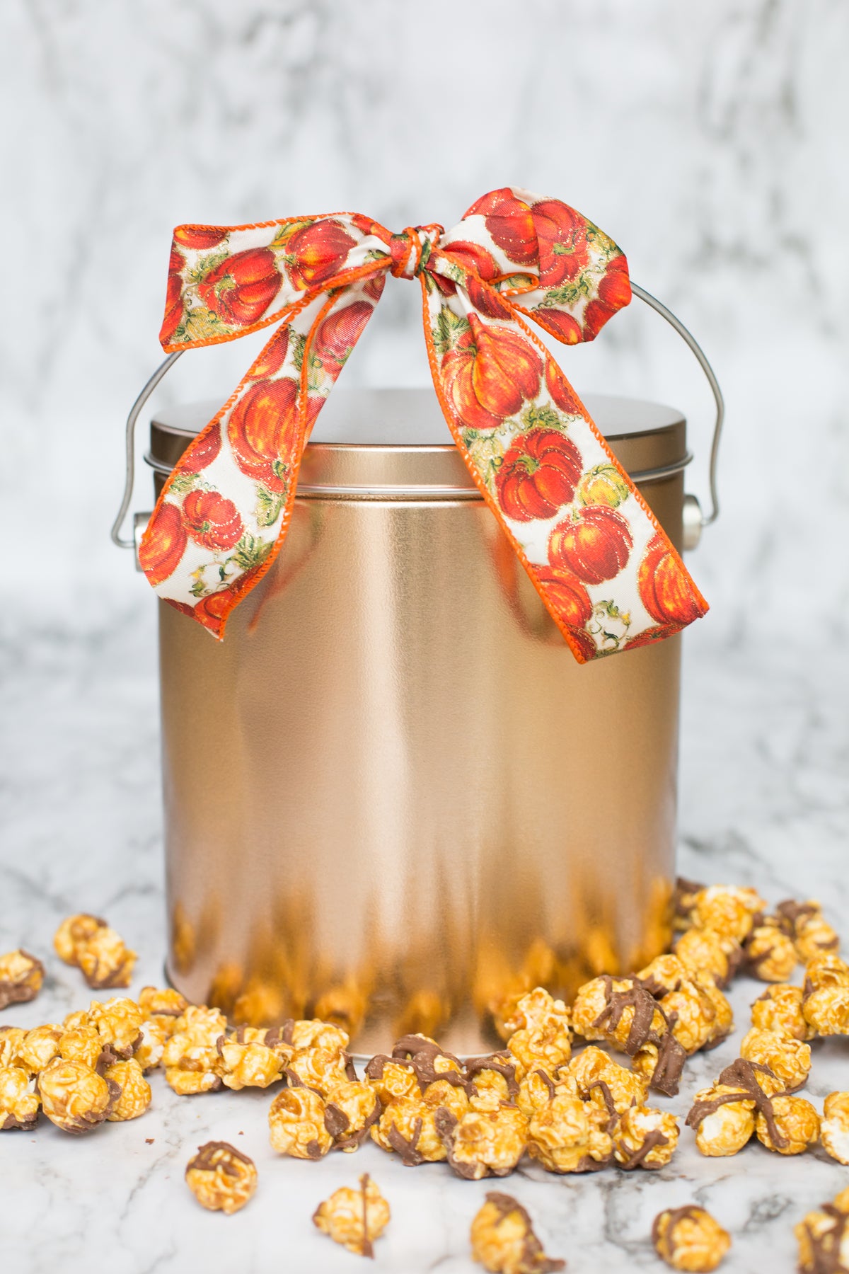 Sugar Plum Pumpkin Popcorn With Chocolate Drizzle