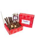 Chocolate Eruption Gourmet Chocolate Gift Box with 26 hand-dipped treats including cookies, popcorn, and pretzels in a red box.