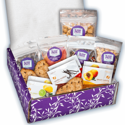 Gourmet snack care package with 15 sweet and salty treats in a purple box, perfect for sympathy or get-well gifts.