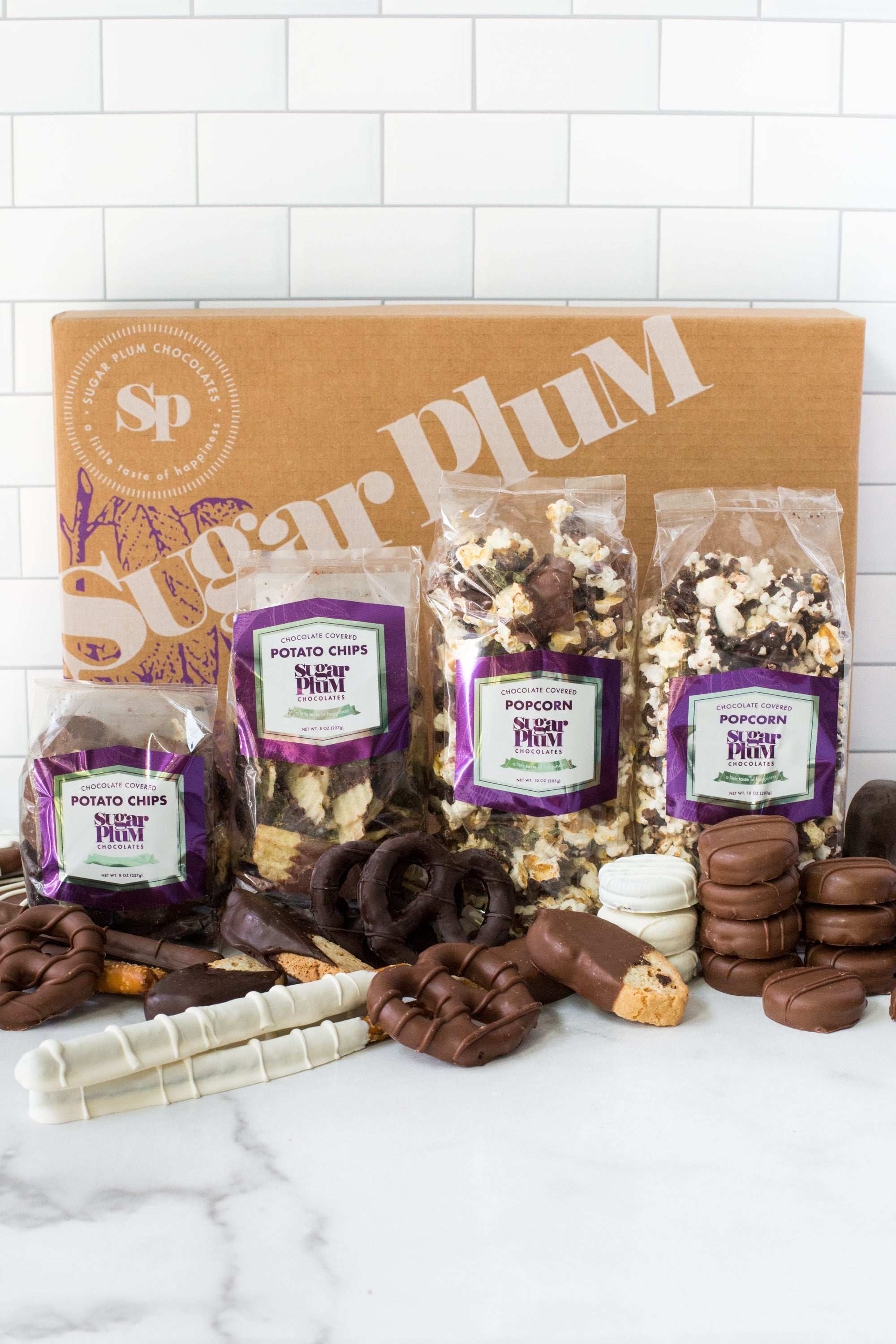 Sugar Plum Double Decadence chocolate assortment with gourmet milk, dark, and white chocolates, perfect gift box for special occasions.