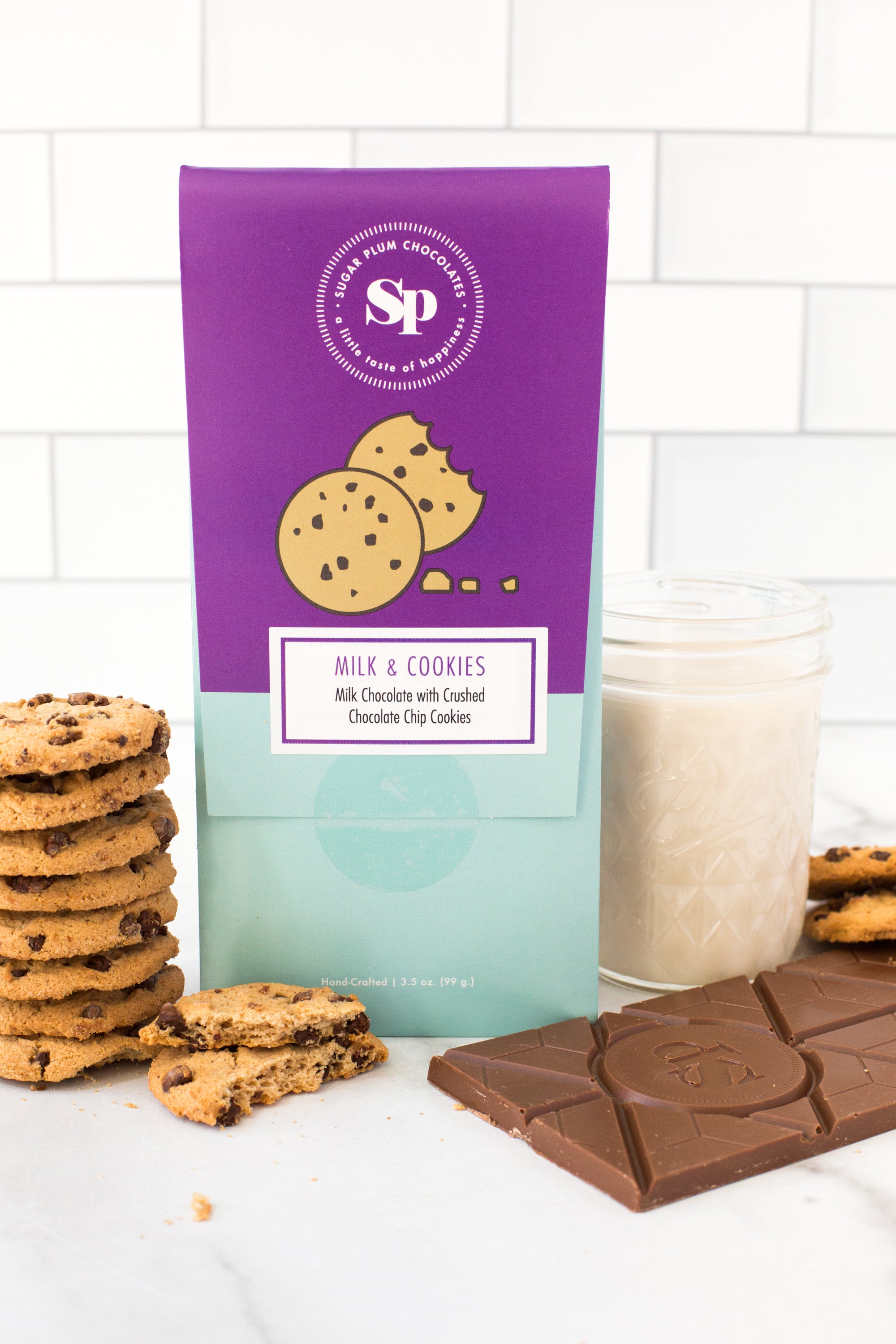 Nostalgic Milk & Cookies Chocolate Bar with a stack of cookies and a glass of milk