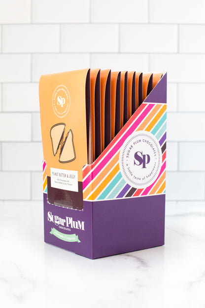 Nostalgic Chocolate Bars 10-Pack with Childhood-Inspired Flavors in Colorful Packaging by Sugar Plum Chocolates