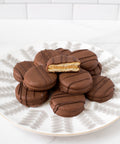 12 handcrafted chocolate-covered peanut butter cracker cookies for your snacking pleasure.