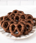 Plate of chocolate-covered pretzels, handcrafted from fresh Pennsylvania pretzels for snacking and gifting.