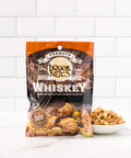 Whiskey flavored peanuts pack with bowl of peanuts, featuring gourmet liquor-inspired snacks perfect for gifting.