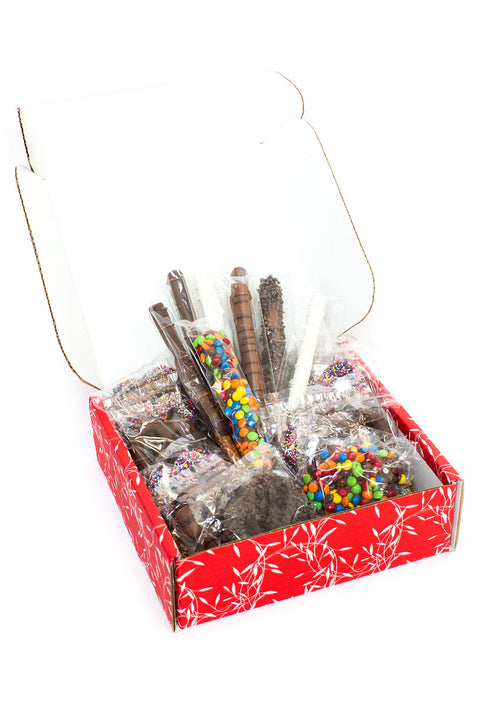 Open Red box Chocolate Pretzel Passion Gift Assortment with white background. 