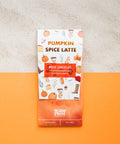 Pumpkin Spice Latte White Chocolate Bar on orange background with fall-themed packaging.