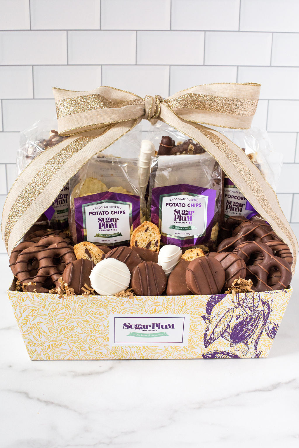 Chocolate Kilimanjaro Gift Basket with gourmet treats, including chocolate-covered snacks, perfect for special occasions by Sugar Plum.