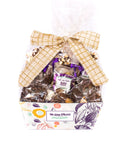 Sugar Plum Chocolate Matterhorn Gift Basket with a bow, featuring an assortment of handcrafted milk, dark, and white chocolate snacks.