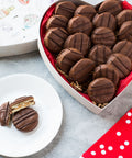 Valentine’s Day Milk Chocolate loaded with Peanut Butter Cracker Cookies on a plate.