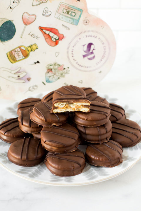 Milk Chocolate filled with Peanut Butter Cookies on a plate - Sugar Plum Chocolates