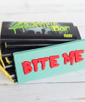 Handcrafted Chocolate Zombie Bar with "Bite Me" text, spooky green white chocolate with crispies, Halloween party candy.