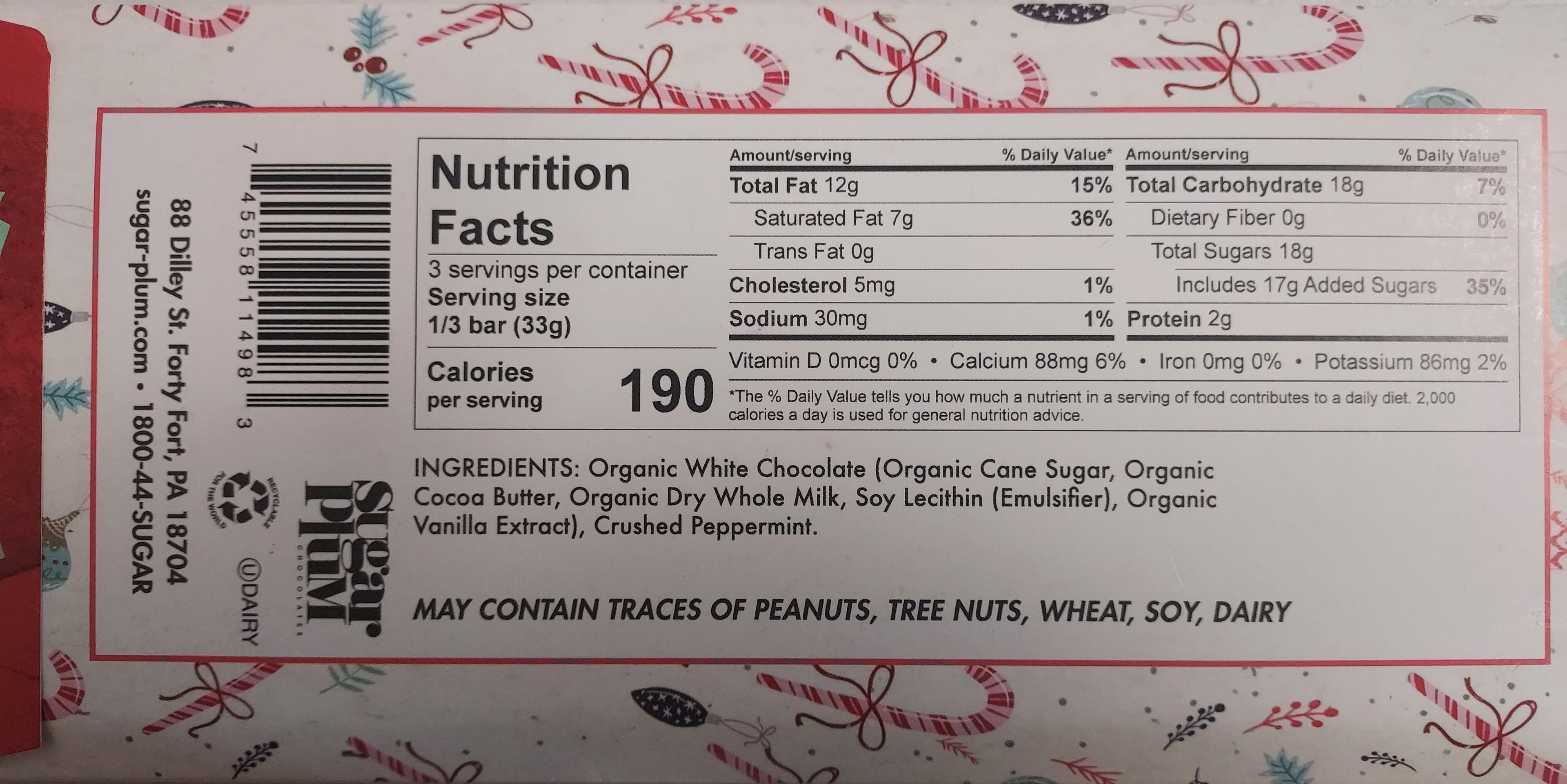 Nutrition facts label of Candy Cane White Chocolate Bar showing ingredients and allergens on a holiday-themed background.