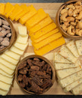 Signature Bowl of Nuts and Slices of Cheese