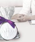 White chocolate aspirin gift with purple bow for Nurse and Doctor Appreciation Day