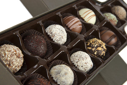 Wine truffle box with 12 handcrafted gourmet chocolate truffles in assorted flavors, perfect gift for wine lovers.